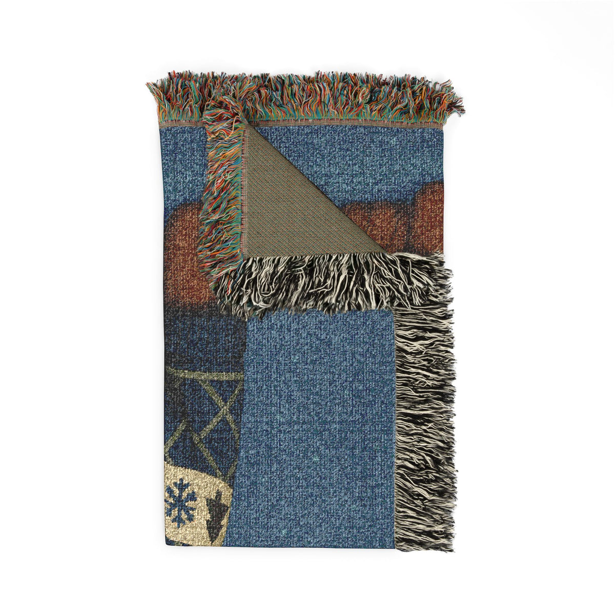 Close-up of the Tricolor Cavalier woven blanket corner showing the fringed edge and the reverse side of the cotton weave