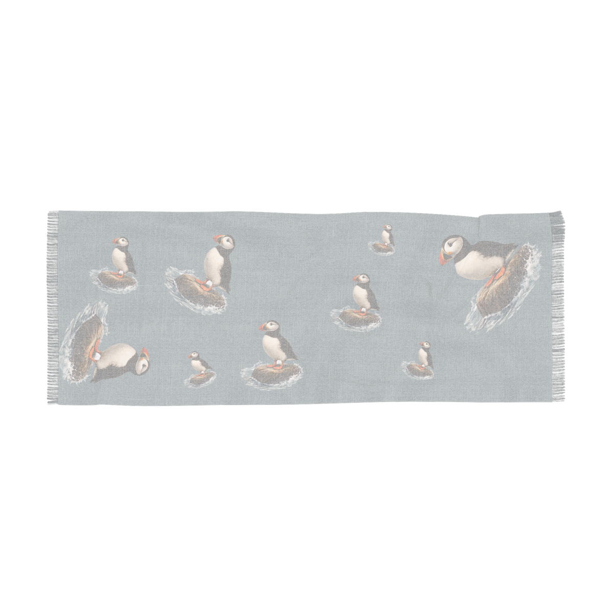 Bram Coastal Stillness wrap laid flat, lighter view of the puffin print